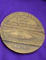 An engraved medal in original box issued by FC Porto for the 1976/77 season celebrating 70 years