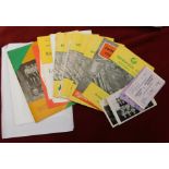 A complete set of 11 programmes (plus 2 tickets and 2 multiple signed postcards) for each of Norwich