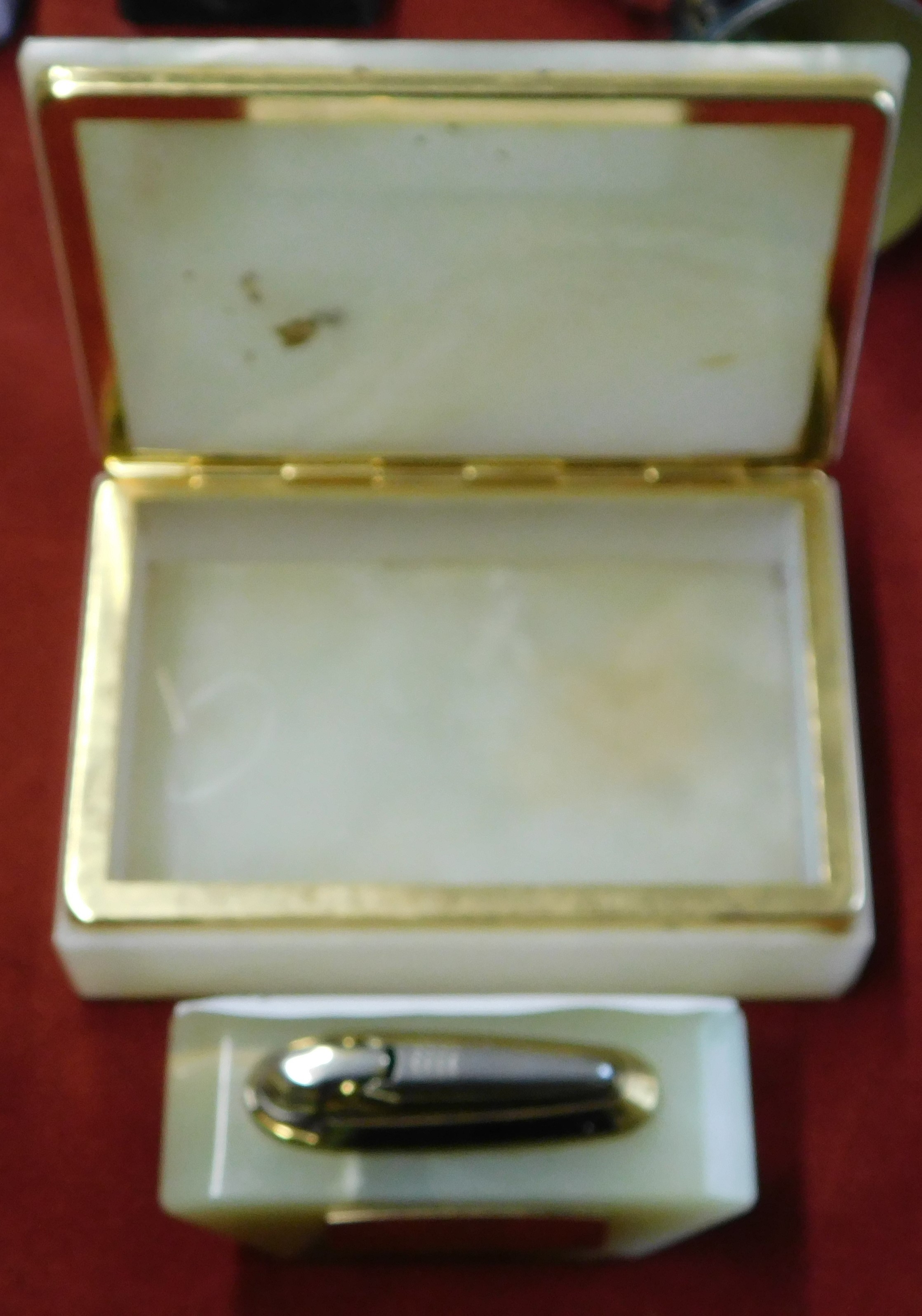 A green onyx cigarette case and lighter inscribed "Many thanks from Denis Law" Manchester United v