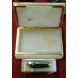 A green onyx cigarette case and lighter inscribed "Many thanks from Denis Law" Manchester United v