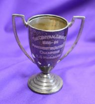 An engraved Central League Winners Trophy presented to Kenny Morgans of Manchester United from the