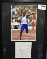 Framed signed photo of Linford Christie, signed back stage at Granada Studios after filing