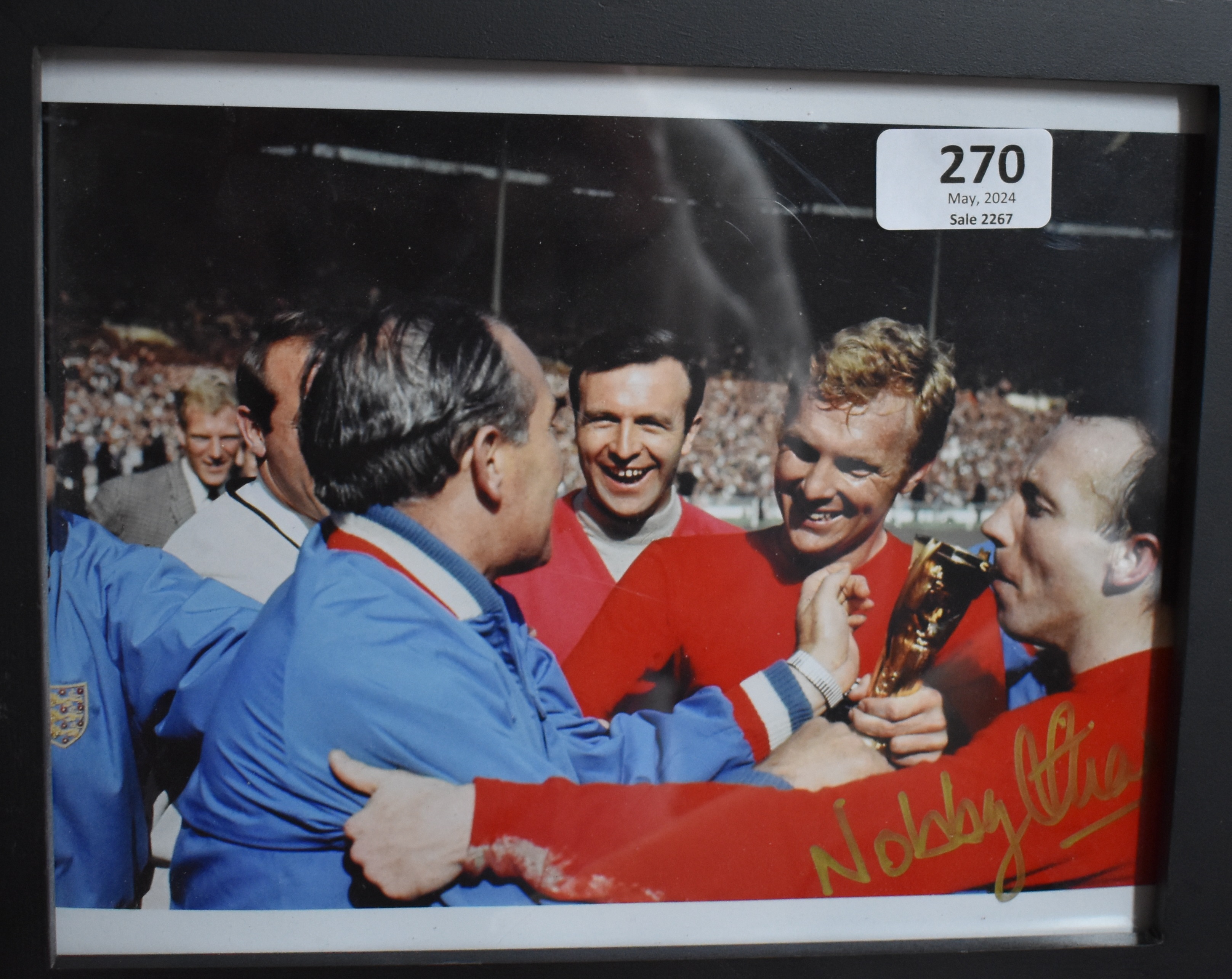 Signed photo in a frame (28 x 23 cms) from the 1966 World Cup Final with England manager Sir Alf