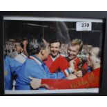 Signed photo in a frame (28 x 23 cms) from the 1966 World Cup Final with England manager Sir Alf