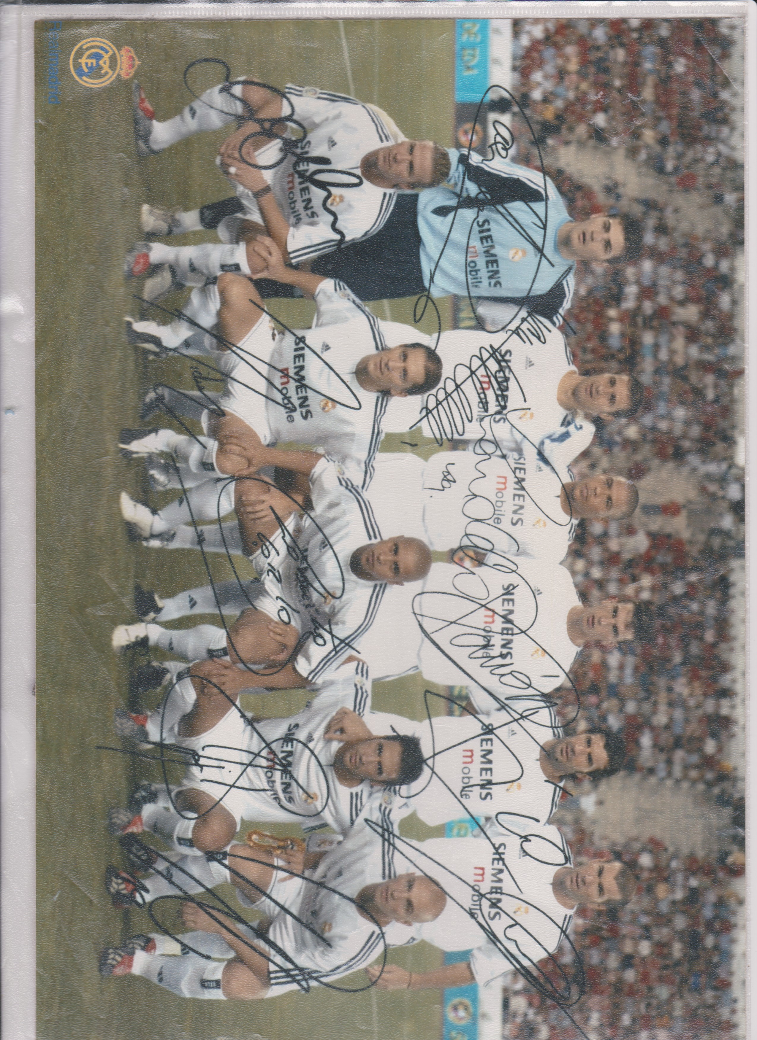 A signed colour team photo of Real Madrid from the 2002/03 season. Signed by David Beckham, Zinadine