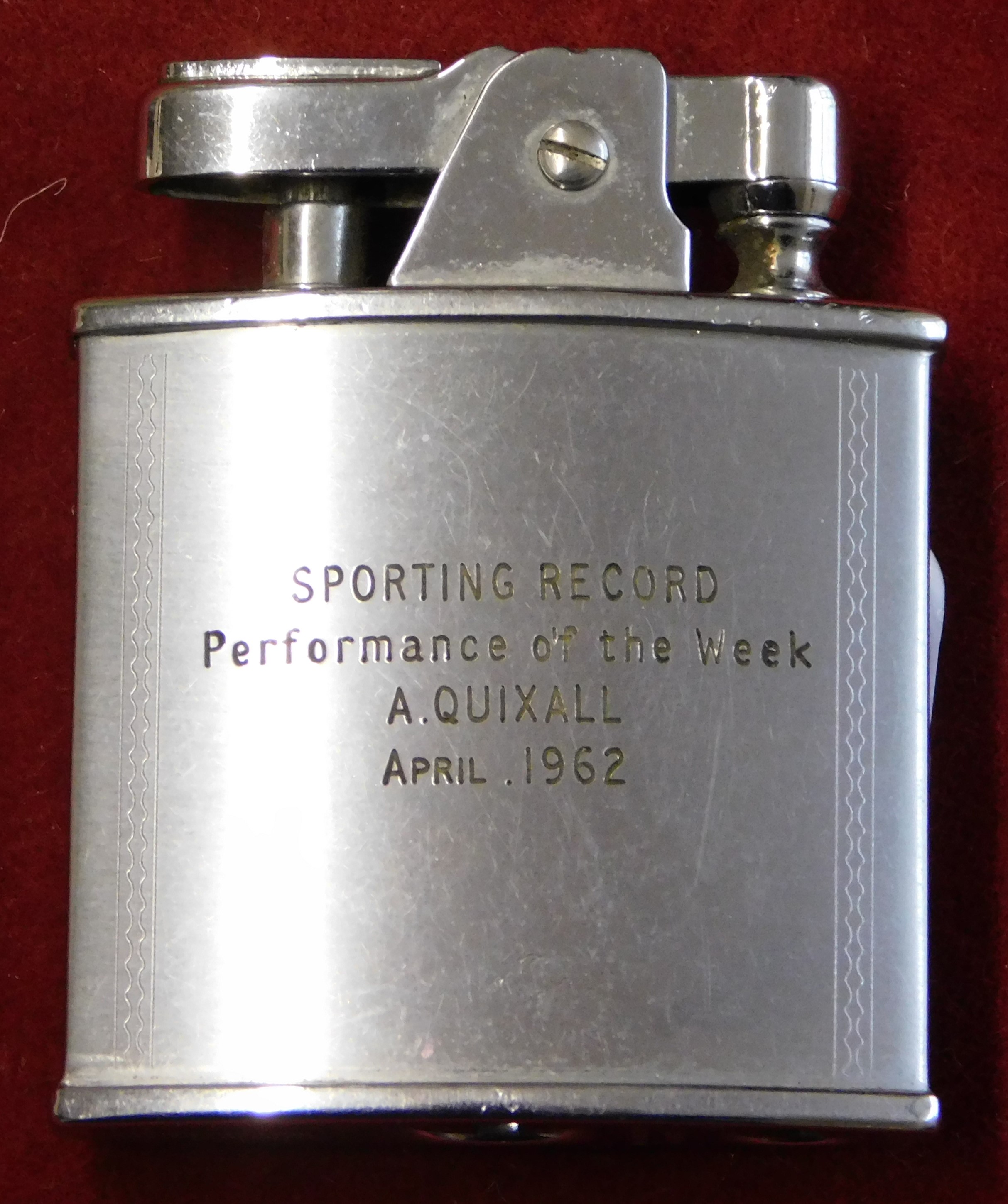 A lighter presented to Albert Quixall of Manchester United engraved with his name for the