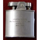 A lighter presented to Albert Quixall of Manchester United engraved with his name for the