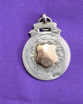 A Gold on silver hallmarked medal by Thomas Fattorini Ltd, An unissued Air inscribed metal, good for