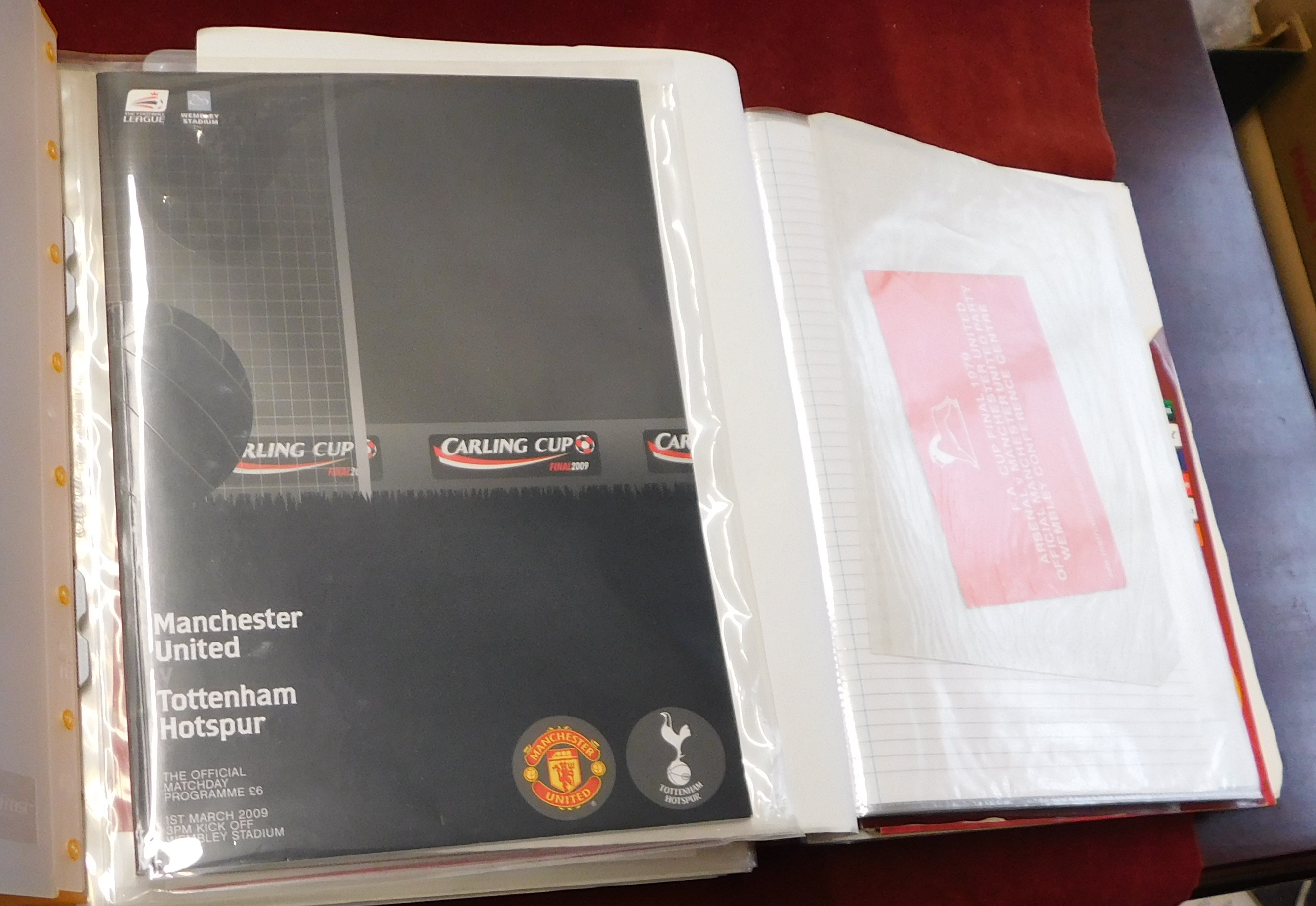 Three folders of Manchester United ephemera from the 1970s to the 2000s. A hospitality card at