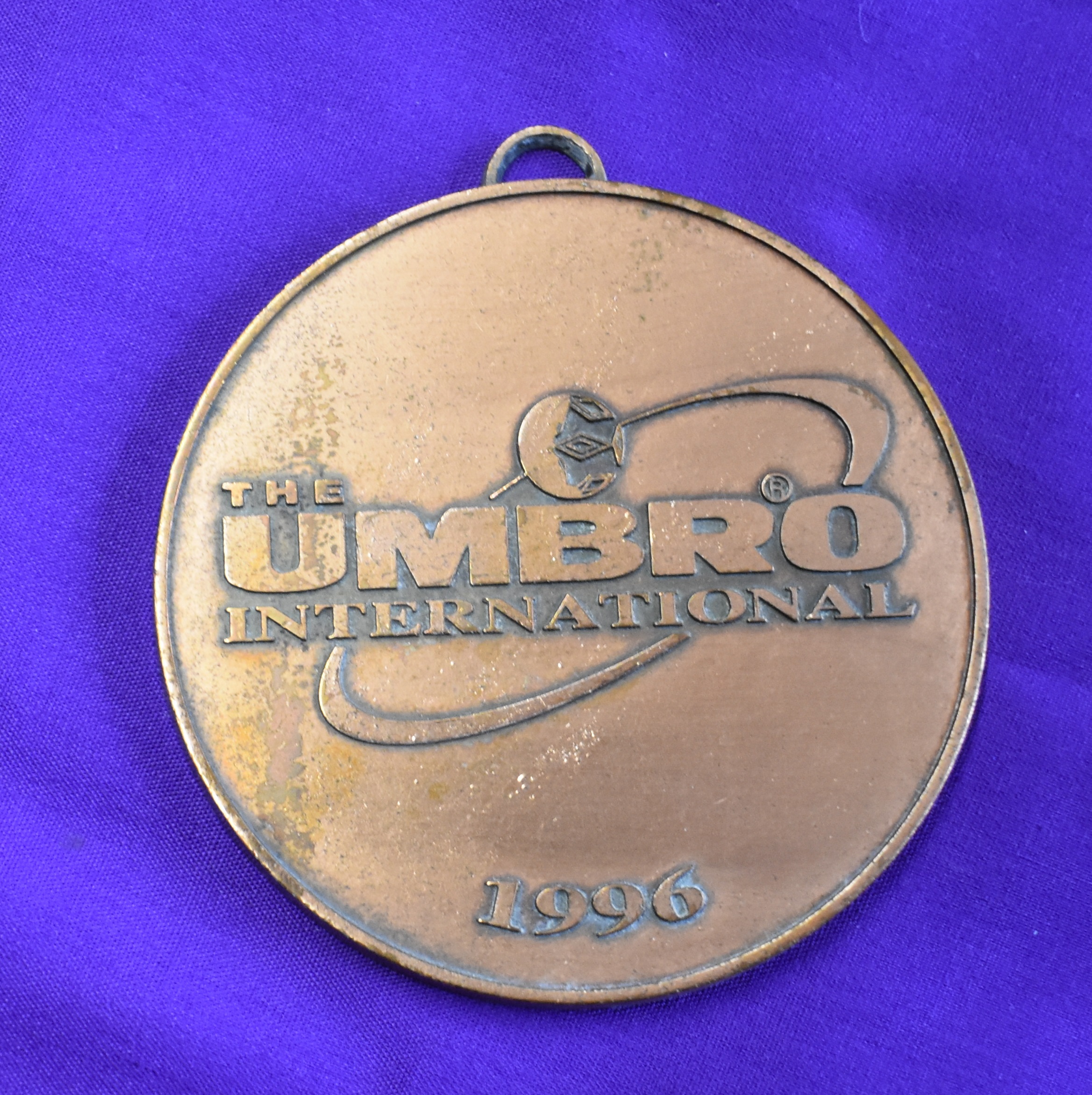 A medal presented to a Manchester United player from the Umbro International Tournament after the