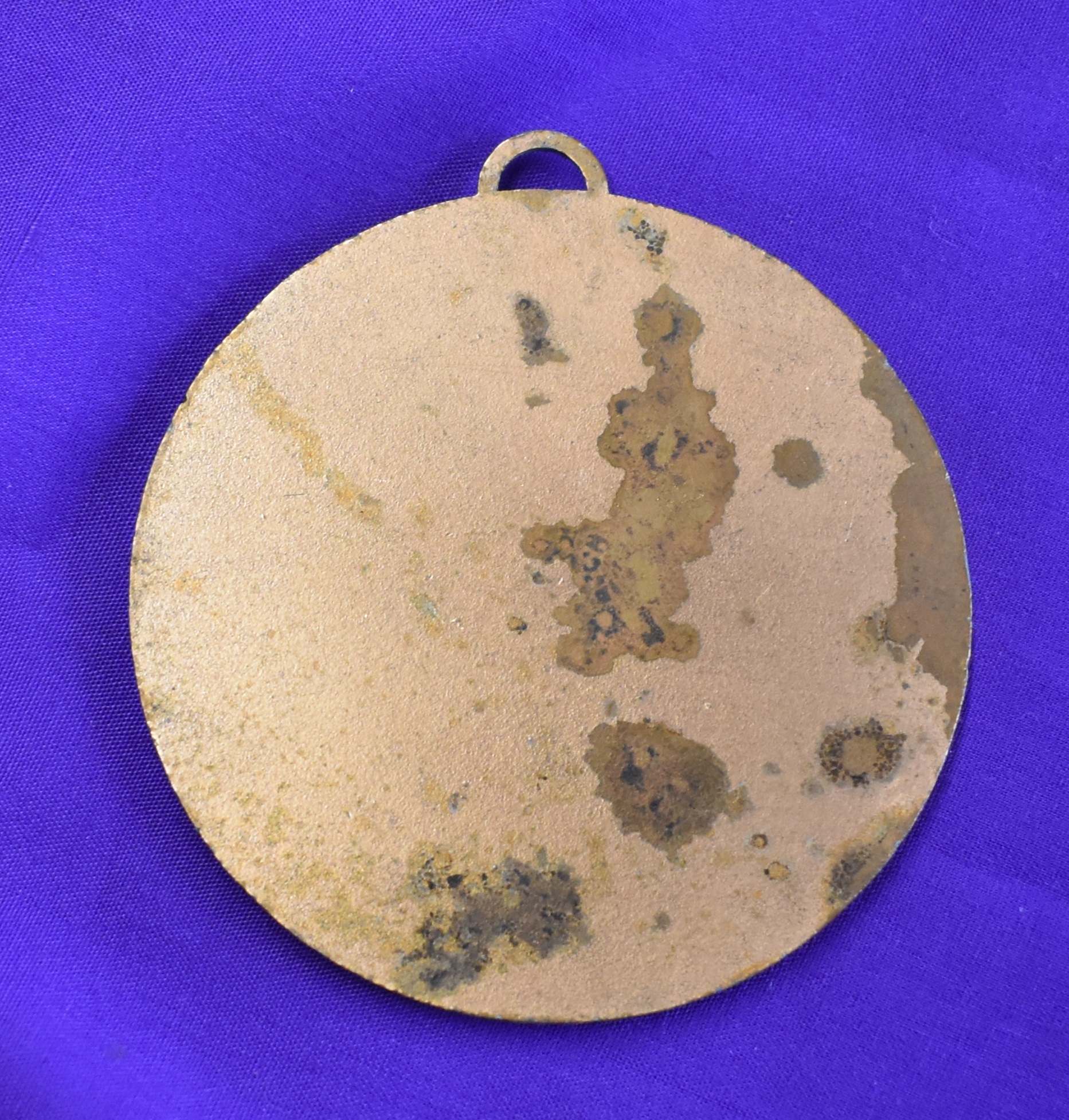 A medal presented to a Manchester United player from the Umbro International Tournament after the - Image 2 of 2