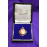 An engraved League Cup Runners Up Medal presented to a Manchester United player from the 1983