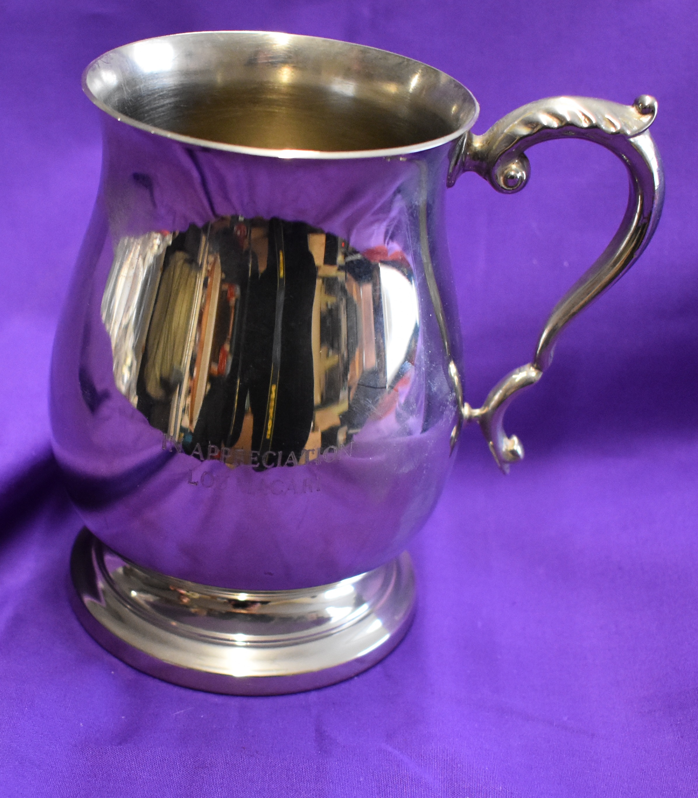 A silver plated goblet engraved simply with the words "In appreciation Lou Macari". Macari played