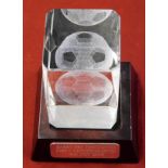 An inscribed glass paperweight on a stand given to Barry Fry on the occasion his Testimonial