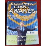 Book 'Sleeping Giant Awakes', hard back fully illustrated in colour, players sign front inside cover