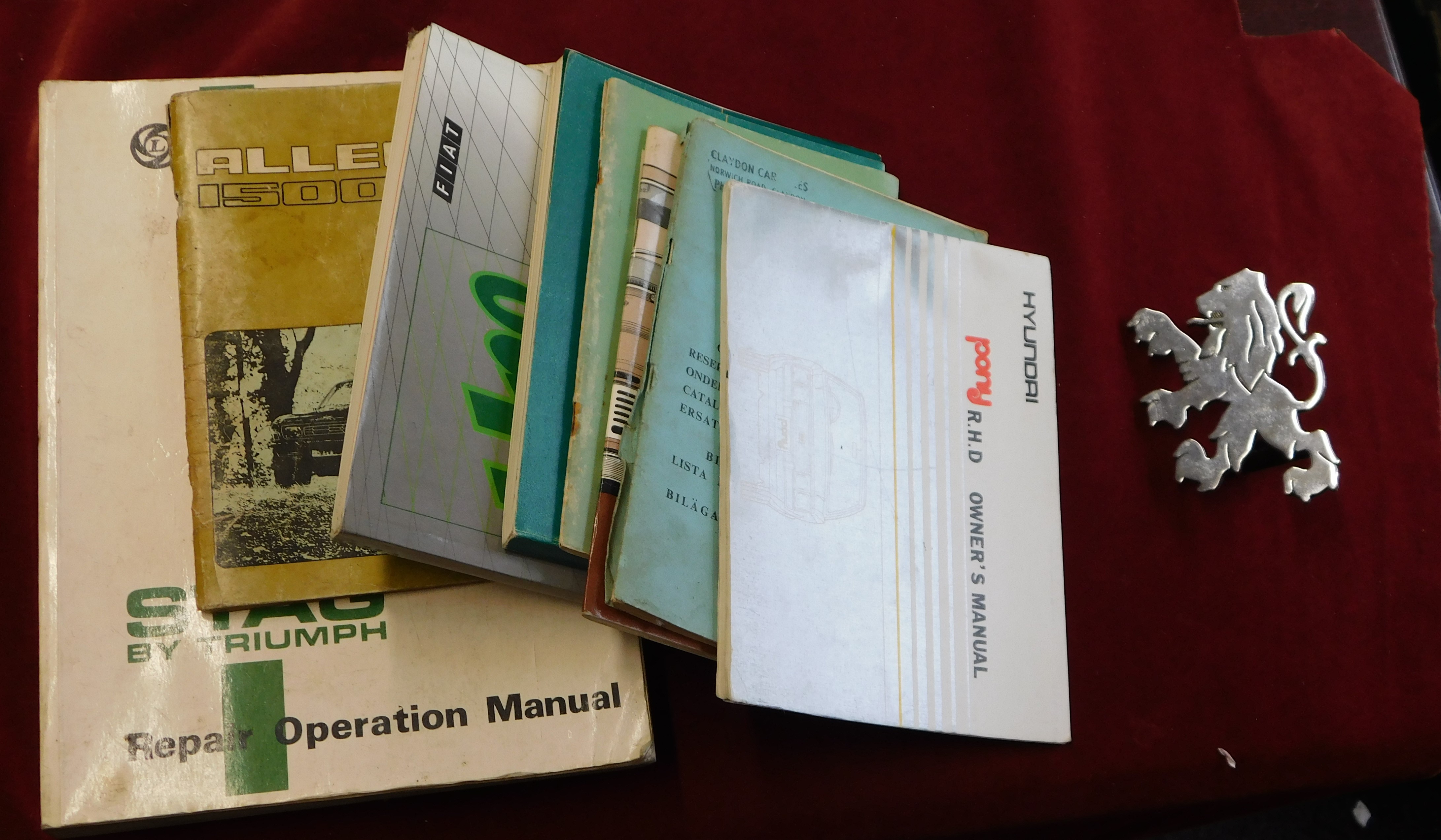 Car Manuals - A collection of manuals including Austin A40, Allegro 1500, Triumph Stag, Fiat Uno,