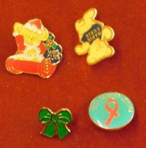 Pin Badges - (2) Marie Curie, (1) breast cancer, (1) Green Bow, very good condition