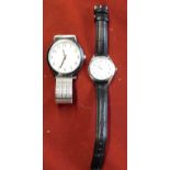 Watches - (1) Gents watch Quartz RNIB 56834, metal strap - (1) Ladies watch 'Loris' black leather