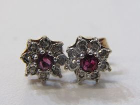 RUBY & DIAMOND CLUSTER EARRINGS, a pair of 9ct gold earrings set a central ruby surrounded by a