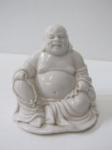 ORIENTAL CERAMICS, Blanc de chine figure of seated Buddha, 11cm height