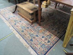 LARGE HAND KNOTTED CARPET, the centre with medallions on pink ground, main borders with stylised