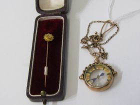 VINTAGE COMPASS, a gold framed compass on safety chain together with a vintage gold stick pin set