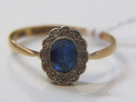 18ct YELLOW GOLD SAPPHIRE & DIAMOND RING, principal oval cut rich blue sapphire surrounded by