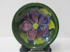 MOORCROFT, green ground "Clematis" pattern 18cm circular dish