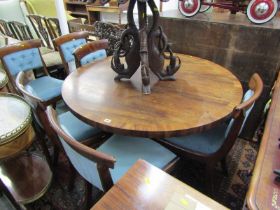 EARLY VICTORIAN CROSS BANDED ROSEWOOD CIRCULAR DINING TABLE, tapering octagonal pedestal with