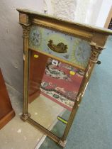 REGENCY gilt column framed narrow mirror glass with reversed glass top panel depicting cottage, 83cm