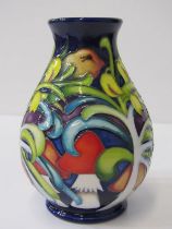 MOORCROFT, "Fairyland" pattern blue ground 14cm vase