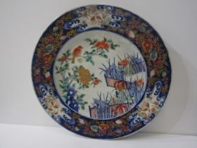 ORIENTAL CERAMICS, a good Arita charger decorated with birds within flag, blossoms and peony