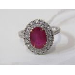 18ct WHITE GOLD RUBY & DIAMOND CLUSTER RING, principal oval cut ruby, approx. 2 carats, surrounded