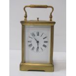 REPEATER CARRIAGE CLOCK, a brass cased and bevelled glass carriage clock, coil bar strike with plain