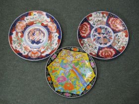 ORIENTAL CERAMICS, 2 gilded Arita 40cm chargers decorated with garden reserves, also famille