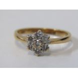 18ct YELLOW GOLD DIAMOND DAISY STYLE RING, 7 stone daisy, 6 bright well matched brilliant cut