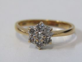 18ct YELLOW GOLD DIAMOND DAISY STYLE RING, 7 stone daisy, 6 bright well matched brilliant cut