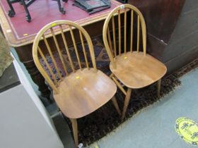ERCOL STYLE, pair of light elm spindle back Windsor kitchen chairs