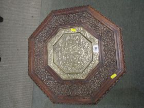 CARVED EASTERN FOLDING TABLE, carved folding octagonal table with octagonal brass central tray