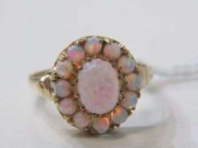 9ct YELLOW GOLD OPAL CLUSTER STYLE RING, large principal oval cut surrounded by circular cabochon