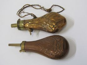 SPORTING, 2 x 19th century embossed copper powder flasks, 1 with cannon and flag design