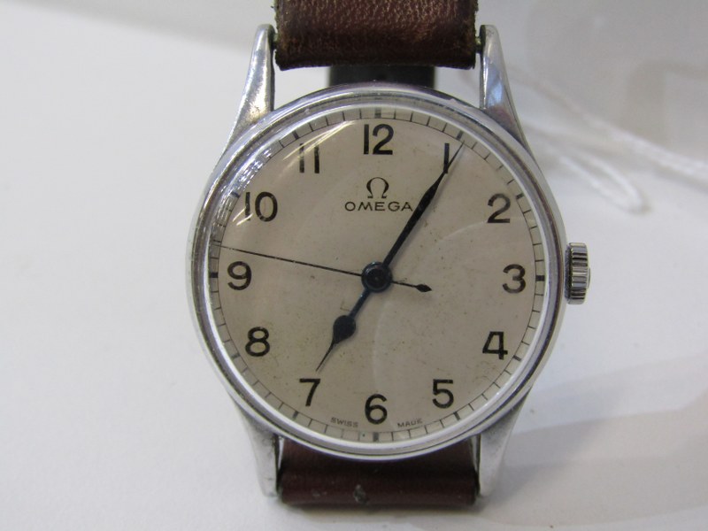 OMEGA WRIST WATCH, movement dating from 1943, marked to the rear with military insignia, possibly
