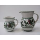 ALDERMASTON POTTERY, 2 Aldermaston pottery jugs both decorated with stylised birds within foliage.
