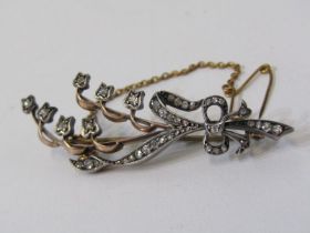 GOLD BROOCH OF FLORAL DESIGN, set with brilliant cut diamonds, pin and safety chain fastening