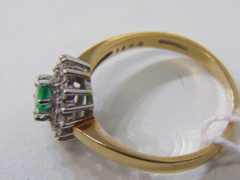 EMERALD AND DIAMOND CLUSTER RING, 18ct yellow gold ring set a central oval emerald surrounded by a - Image 3 of 4