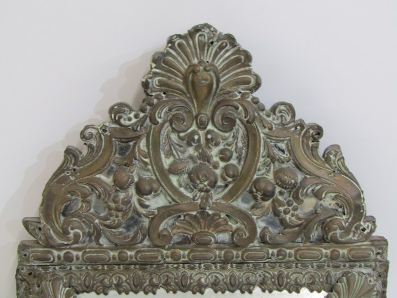 ANTIQUE BRASS MIRROR, bevel edged mirror in a foliate decorated frame in relief, 60cm height - Image 3 of 10