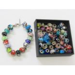 BEADED SILVER CHARM BRACELET & BEADS, Pandora style bracelet marked "Bacio", together with a