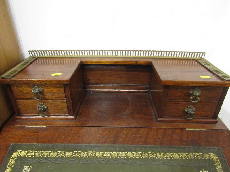 OAK DAVENPORT with brass gallery rail to top, 4 trinket drawers, fitted lower shelf with 2 drawers - Image 4 of 5