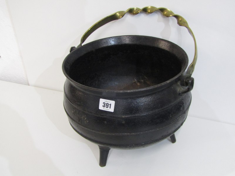 IRON CAULDRON, Clarks iron cauldron on 3 feet, with ornate brass handle, 33cm diameter - Image 3 of 3