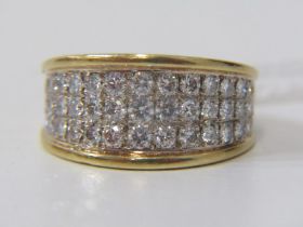 DIAMOND CLUSTER RING, a heavy 18ct yellow gold ring set with 3 rows of round brilliant cut diamonds,